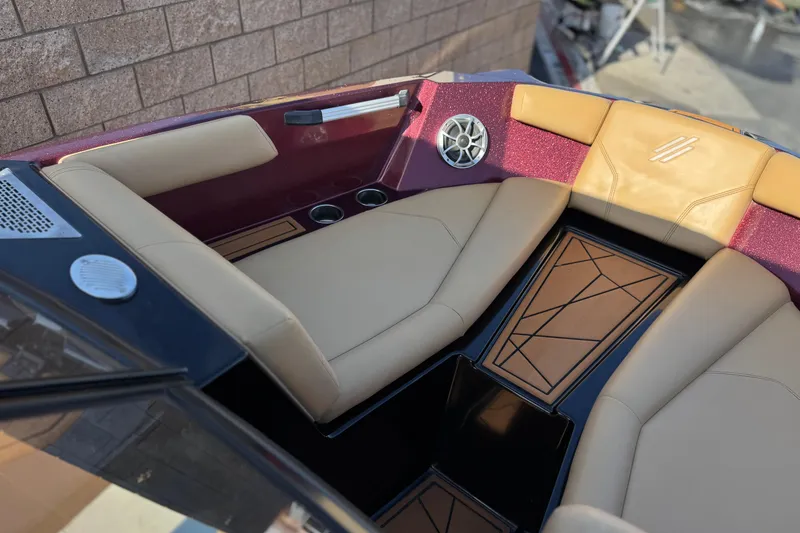 Slide: The Image of Interior of 2020 ATX 22 TYPE S boat with beige seating and speaker system. - 11