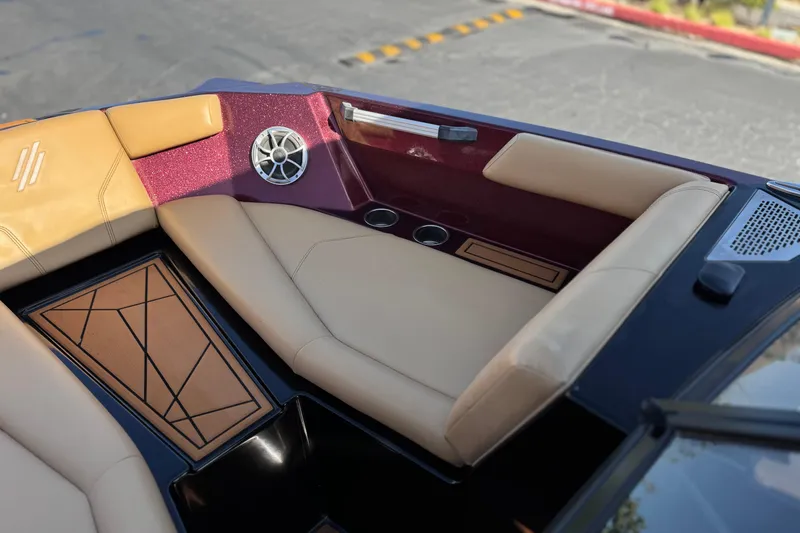 Slide: The Image of Luxurious interior of 2020 ATX 22 TYPE S boat with tan seating and speaker system. - 12