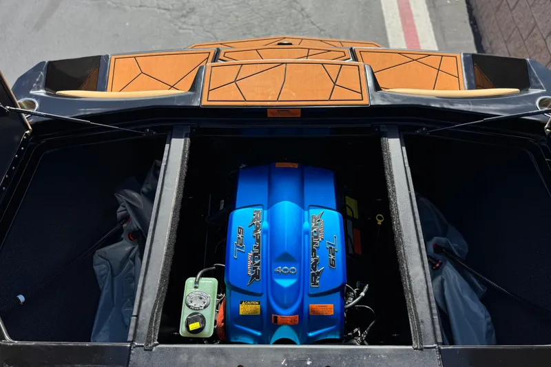 Slide: The Image of Engine compartment of a 2020 ATX 22 TYPE S boat, featuring a Raptor 400 engine. - 19