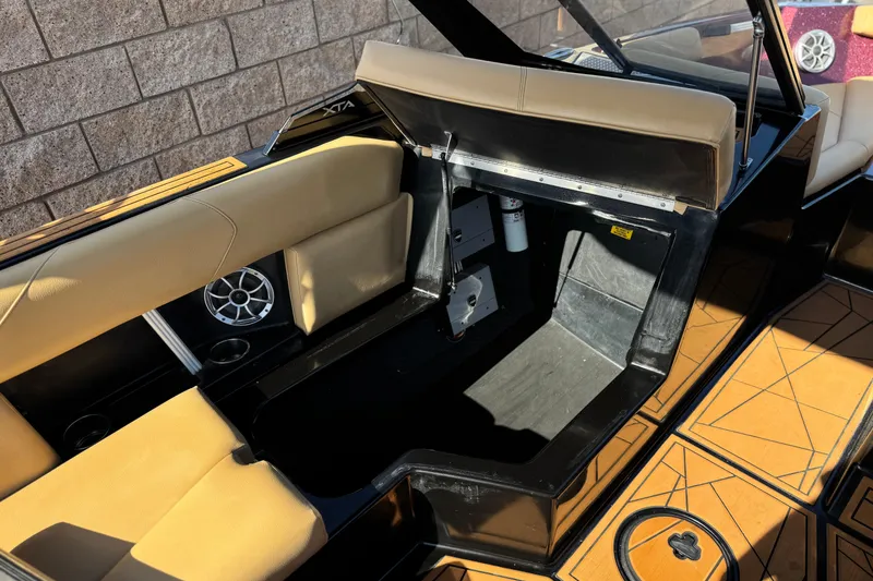 Slide: The Image of Interior of 2020 ATX 22 TYPE S boat with tan seating and speaker system. - 24