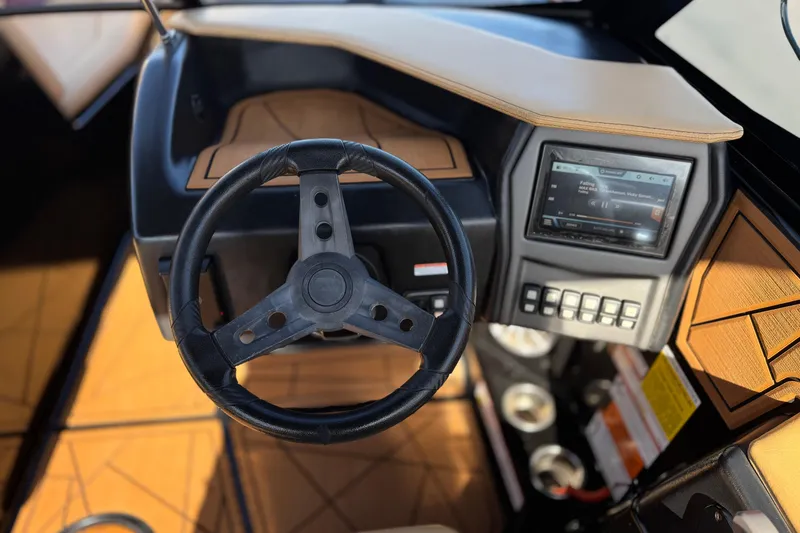 Slide: The Image of Steering wheel and dashboard of 2020 ATX 22 TYPE S boat with touchscreen display. - 28