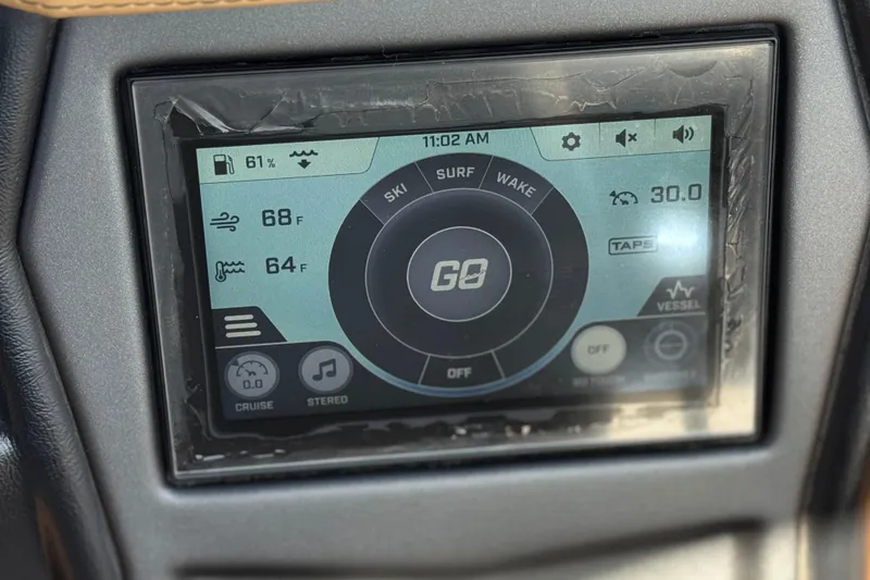 Slide: The Image of ATX 22 TYPE S 2020 boat touchscreen display showing temperature and fuel levels. - 32