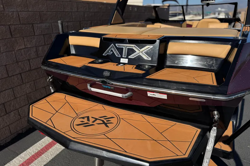 Slide: The Image of 2020 ATX 22 TYPE S boat rear view with tan deck and logo. - 6