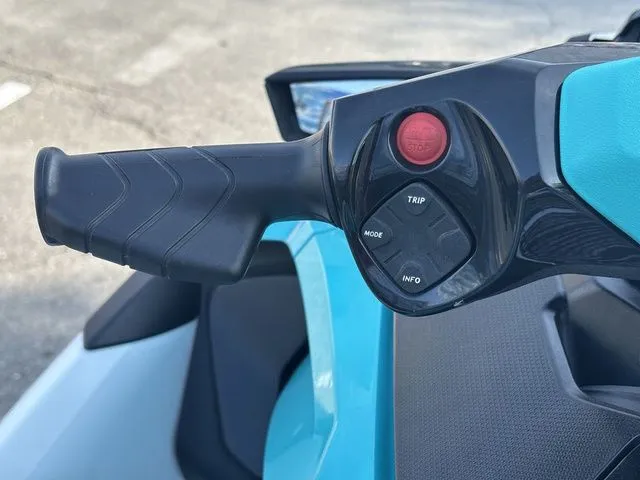 Slide: The Image of Handlebar of a 2022 Sea-Doo GTX 130 PRO with control buttons. - 10
