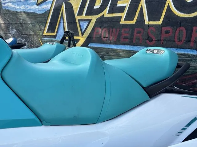 Slide: The Image of 2022 Sea-Doo GTX 130 PRO with turquoise seat against graffiti wall. - 15