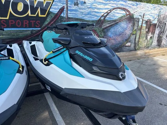 Slide: The Image of 2022 Sea-Doo GTX 130 PRO jet ski parked in front of mural. - 5