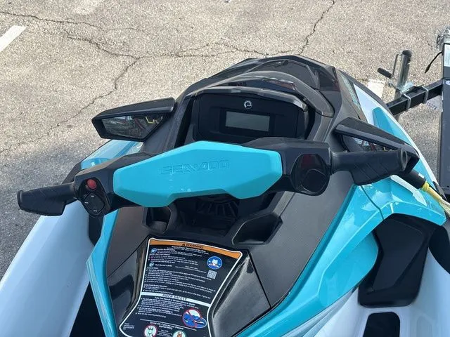 Slide: The Image of 2022 Sea-Doo GTX 130 PRO jet ski with blue handlebars. - 9
