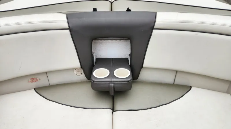 Slide: The Image of Interior of a 2006 Sea Ray 195 Sport boat with cup holders. - 16