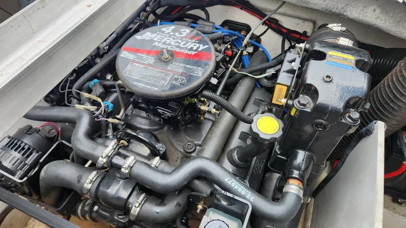 Slide: The Image of Engine compartment of a 2006 Sea Ray 195 Sport with MerCruiser 4.3L engine. - 17