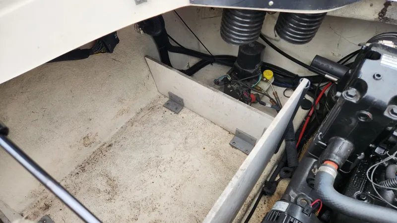 Slide: The Image of Engine compartment of a 2006 Sea Ray 195 Sport boat. - 19