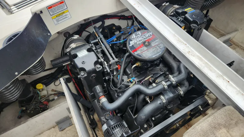 Slide: The Image of Engine compartment of a 2006 Sea Ray 195 Sport boat with MerCruiser engine. - 20