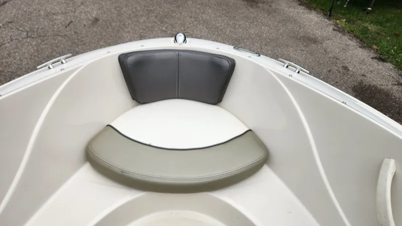 Slide: The Image of Bow seating area of a 2006 Sea Ray 195 Sport boat. - 24