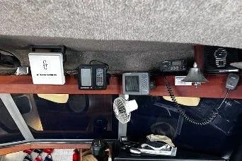 Slide: The Image of Interior electronics of a 1985 Bayliner 3270 Motoryacht, featuring navigation and communication devices. - 8