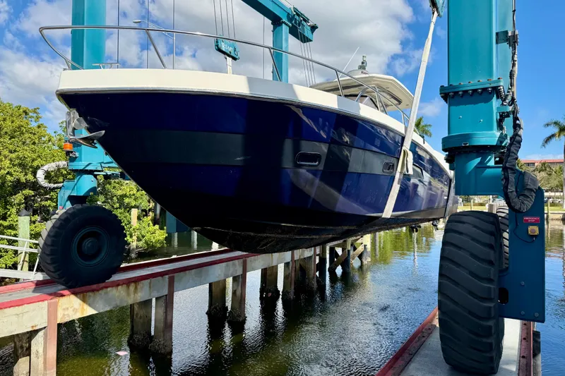 Slide: The Image of Azimut Verve 40 yacht from 2014 being lifted by a boat hoist. - 10