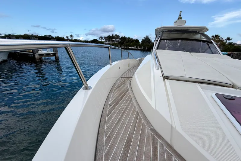 Slide: The Image of Azimut Verve 40 yacht, 2014 model, docked on calm waters with clear sky. - 16