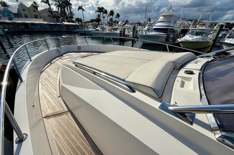 Slide: The Image of 2014 Azimut Verve 40 yacht with sun deck, docked in a marina. - 22