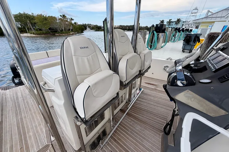Slide: The Image of Interior of 2014 Azimut Verve 40 yacht with sleek seating and modern controls. - 27