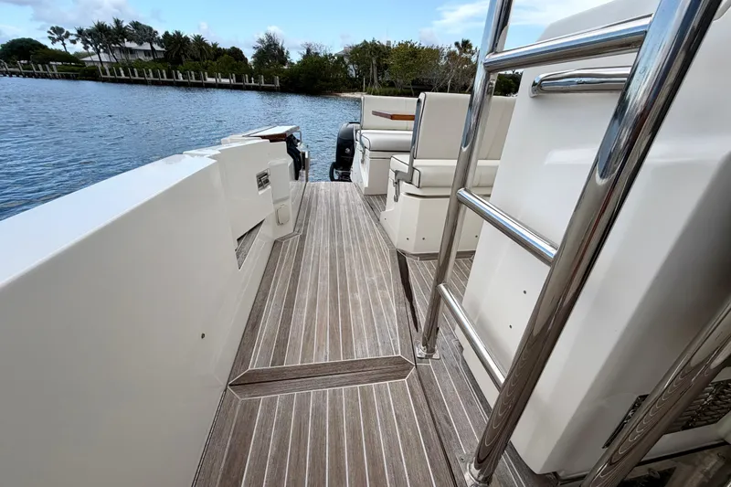 Slide: The Image of Azimut Verve 40 yacht deck, 2014 model, featuring sleek design and waterfront view. - 31
