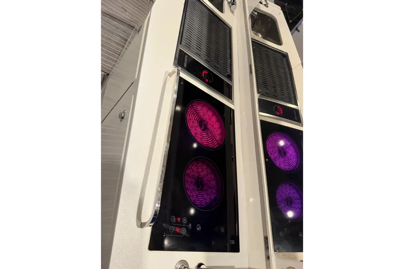 Slide: The Image of Modern kitchen area on a 2014 Azimut Verve 40 yacht with electric cooktop. - 37