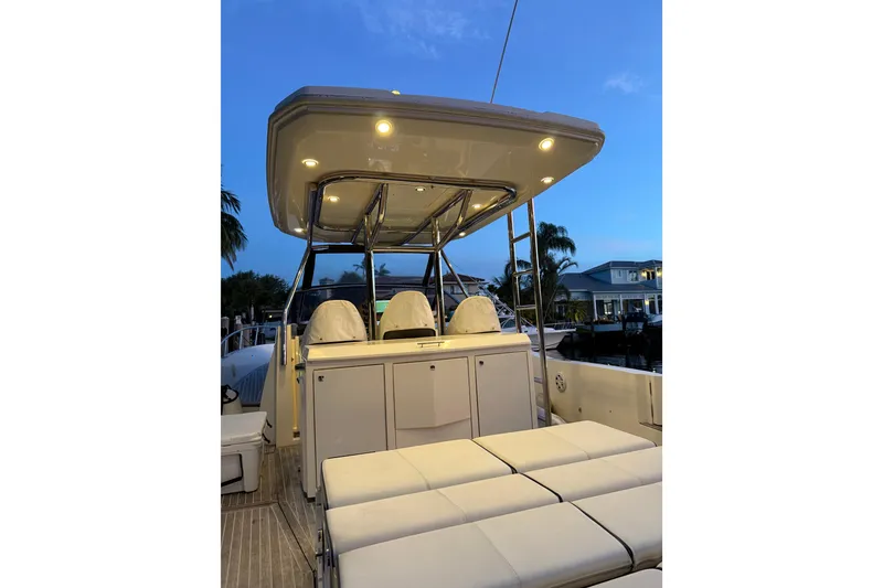 Slide: The Image of Azimut Verve 40 yacht interior, 2014 model, featuring seating and canopy lighting at dusk. - 46