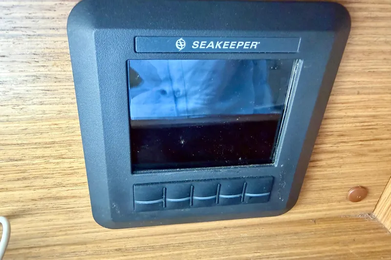 Slide: The Image of Seakeeper control panel on 2014 Azimut Verve 40 yacht dashboard. - 52