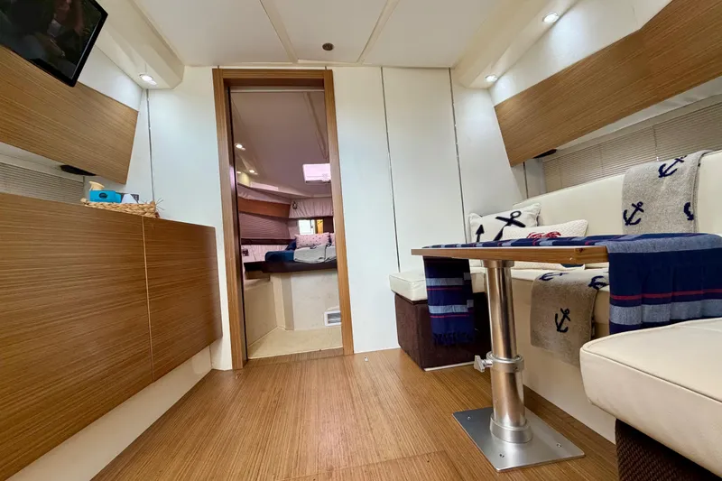 Slide: The Image of Interior of 2014 Azimut Verve 40 yacht with cozy seating and nautical decor. - 55