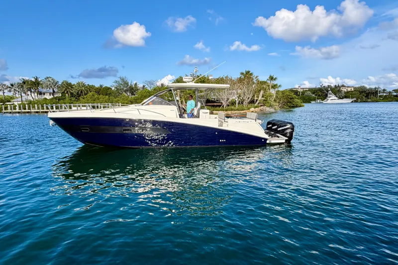 Slide: The Image of 2014 Azimut Verve 40 yacht cruising on a sunny day in a scenic waterway. - 6