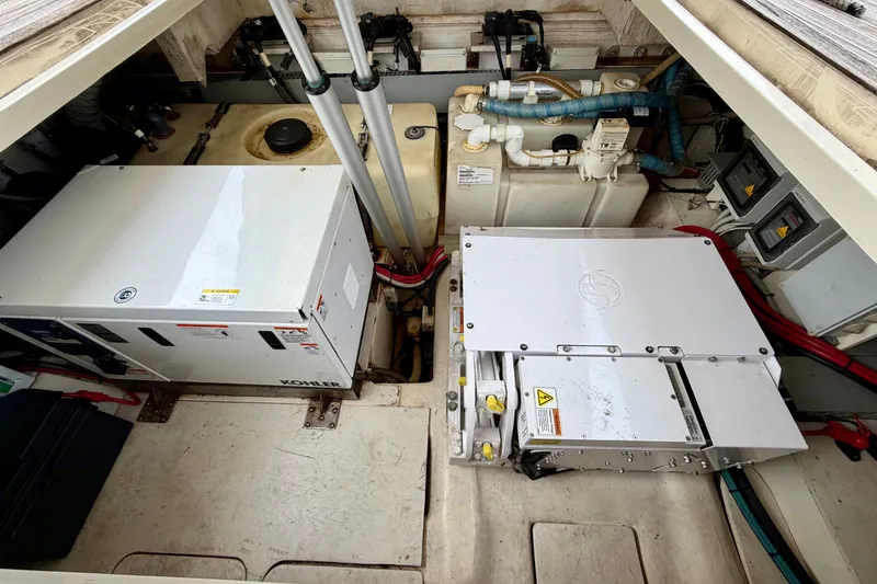 Slide: The Image of Engine compartment of a 2014 Azimut Verve 40 yacht, featuring Kohler equipment. - 62
