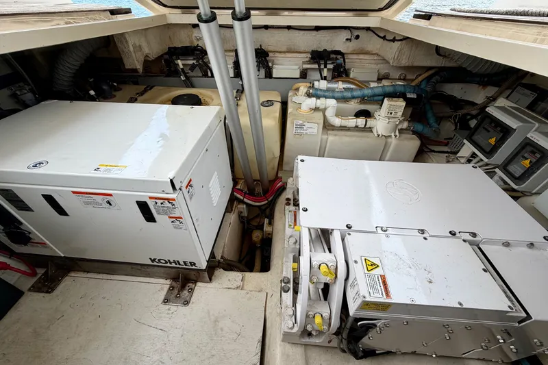 Slide: The Image of Engine room of 2014 Azimut Verve 40 yacht with Kohler generator and mechanical components. - 63