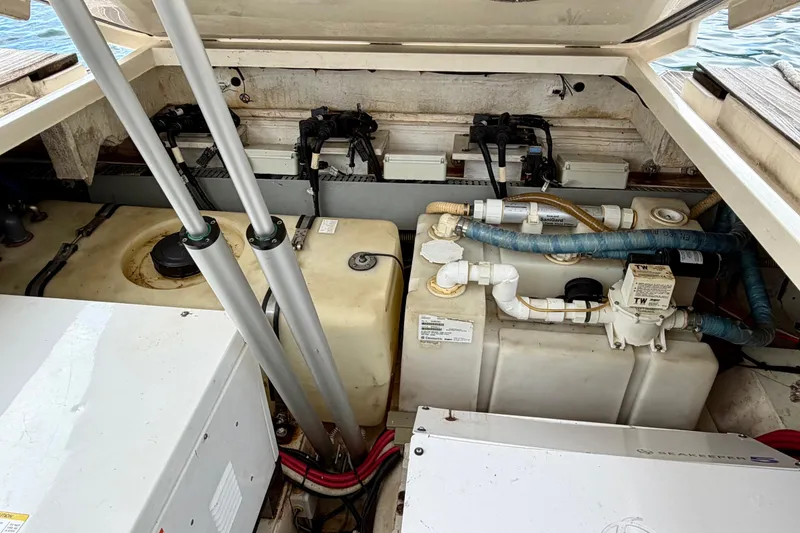 Slide: The Image of Engine compartment of a 2014 Azimut Verve 40 yacht, showing tanks and mechanical components. - 64