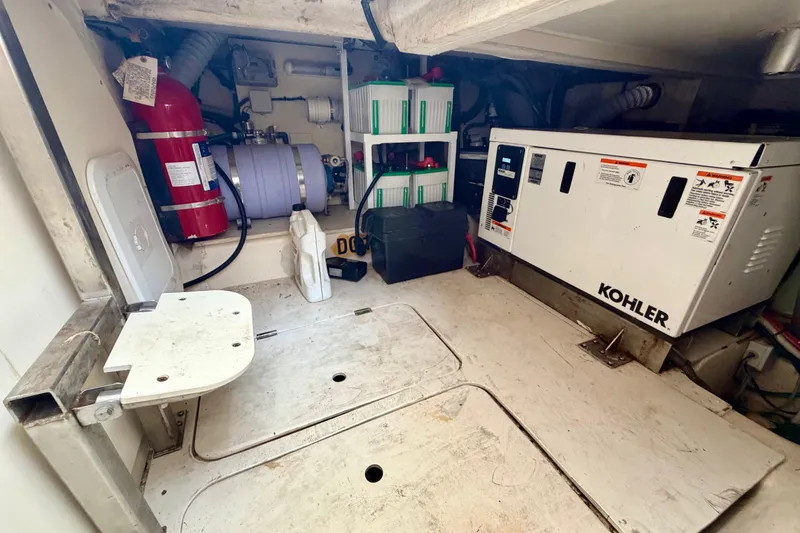 Slide: The Image of Engine room of 2014 Azimut Verve 40 with Kohler generator and safety equipment. - 66