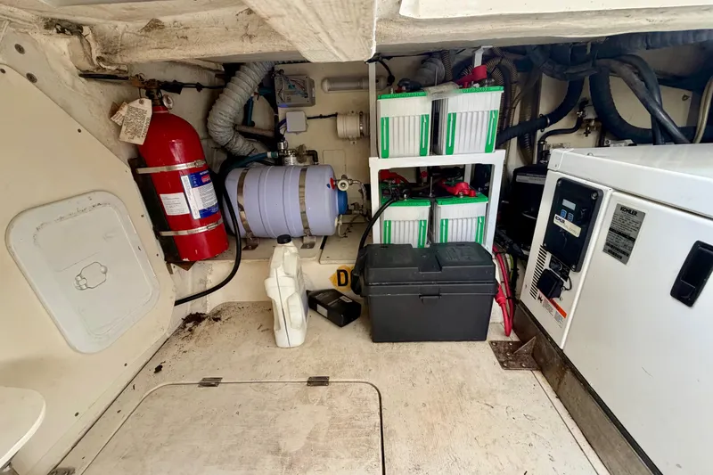 Slide: The Image of Engine room of 2014 Azimut Verve 40 with batteries and fire extinguisher. - 67