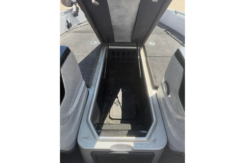 Slide: The Image of Open storage compartment on a 2015 Nitro ZV21 boat deck. - 12