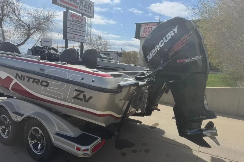 Slide: The Image of 2015 Nitro ZV21 boat with Mercury engine on trailer in dealership lot. - 4