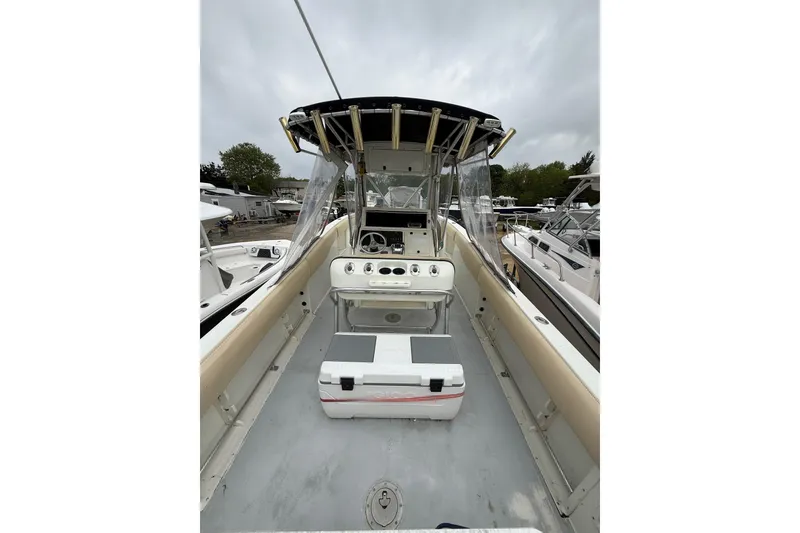 Slide: The Image of 2003 Hydra-Sports Vector 2800 CC boat interior with console and seating. - 14