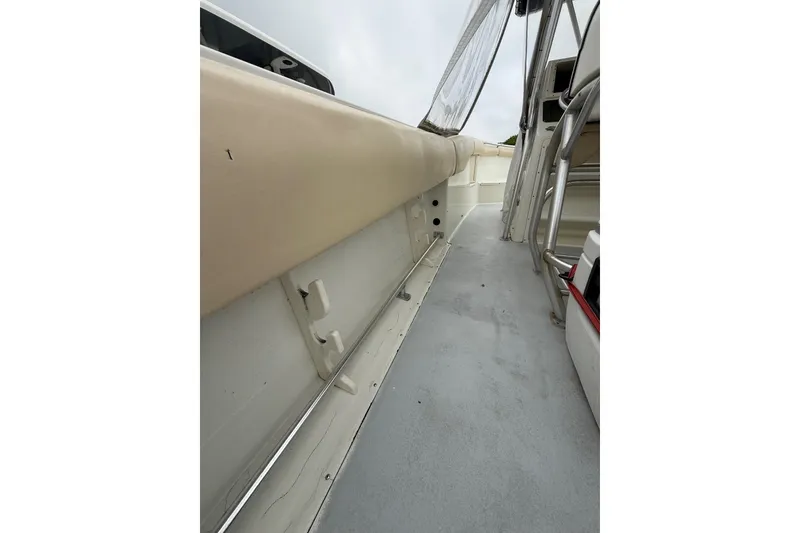 Slide: The Image of 2003 Hydra-Sports Vector 2800 CC boat interior, featuring deck and seating area. - 21