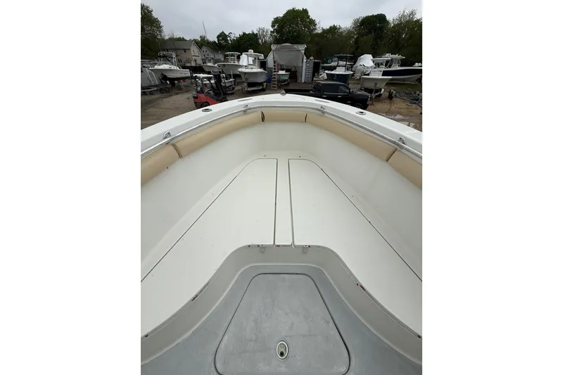 Slide: The Image of 2003 Hydra-Sports Vector 2800 CC boat interior, featuring spacious seating and storage. - 27