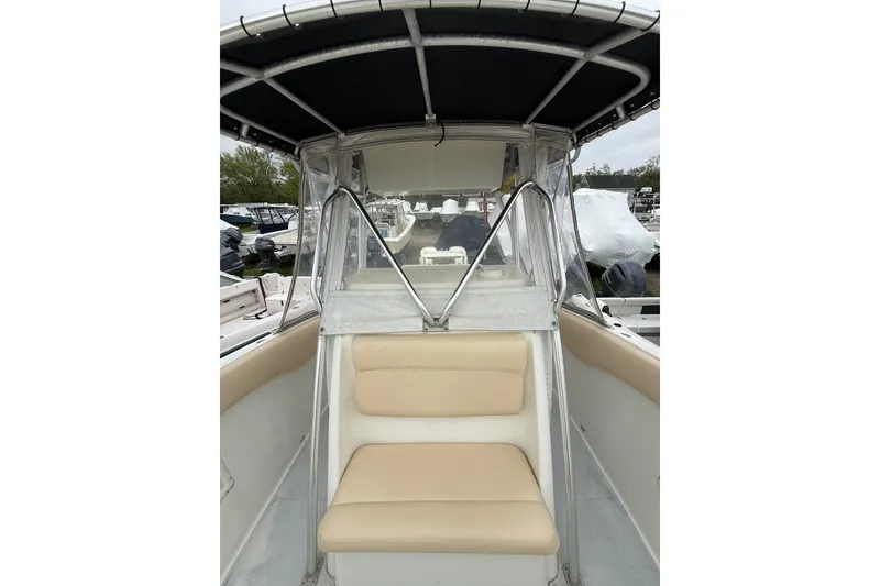 Slide: The Image of 2003 Hydra-Sports Vector 2800 CC boat interior with seating and canopy. - 29