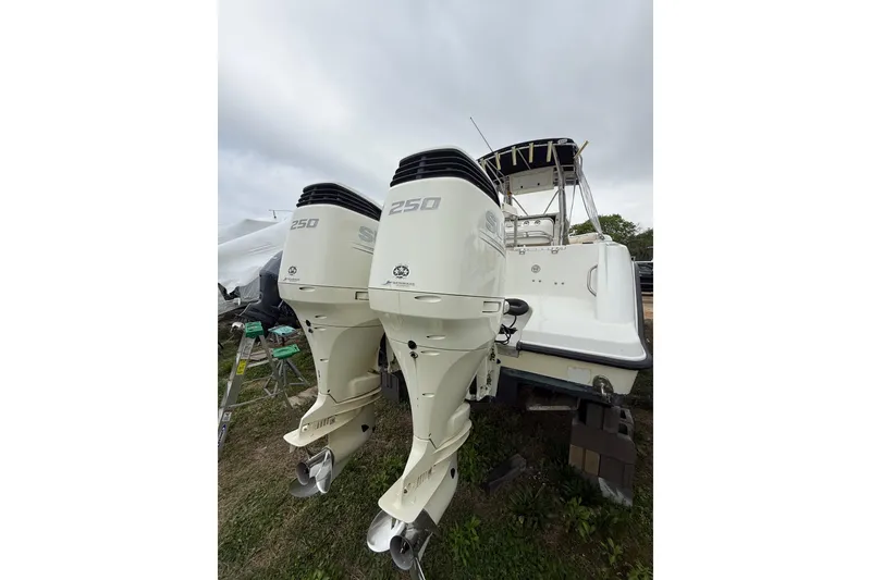Slide: The Image of 2003 Hydra-Sports Vector 2800 CC boat with twin 250 horsepower outboard engines. - 46