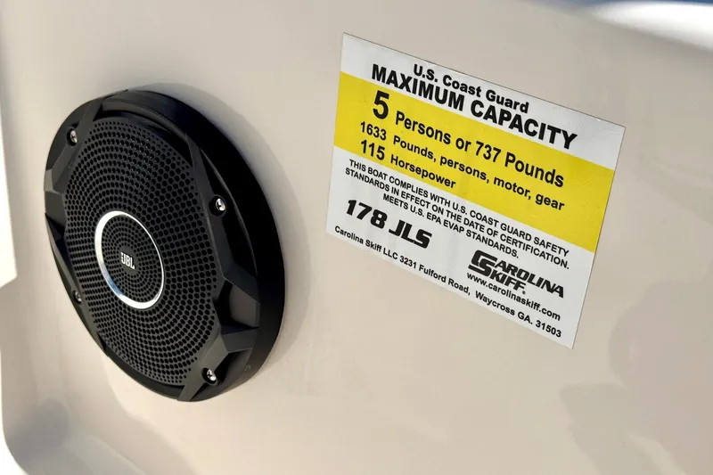 Slide: The Image of 2025 Carolina Skiff 178 JLS capacity label and JBL speaker detail. - 22