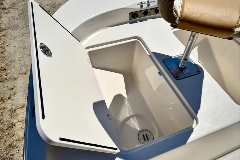 Slide: The Image of Open storage compartment on 2025 Carolina Skiff 178 JLS boat. - 26