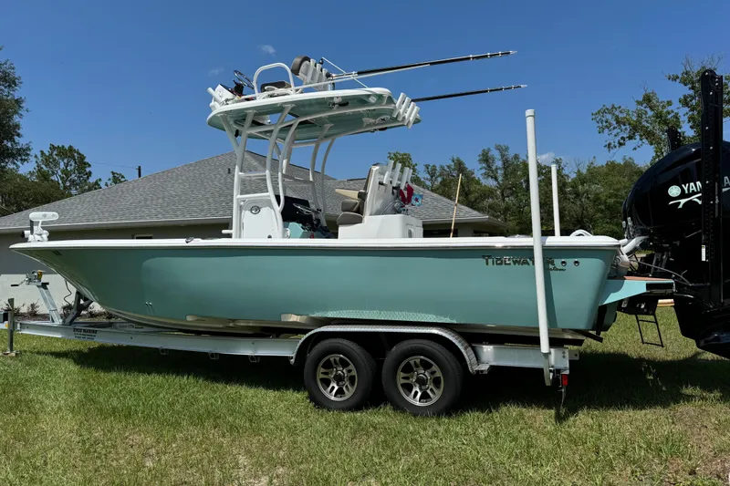 The Image of 2024 Tidewater 2700 Carolina Bay boat on trailer, parked outdoors. - 0