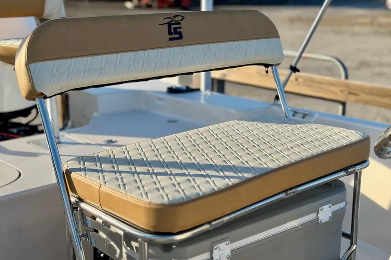 Slide: The Image of 2026 Carolina Skiff 178 JLS boat seat with beige and white upholstery. - 11