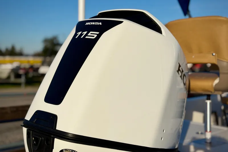 Slide: The Image of Honda 115 outboard motor on 2026 Carolina Skiff 178 JLS boat. - 5