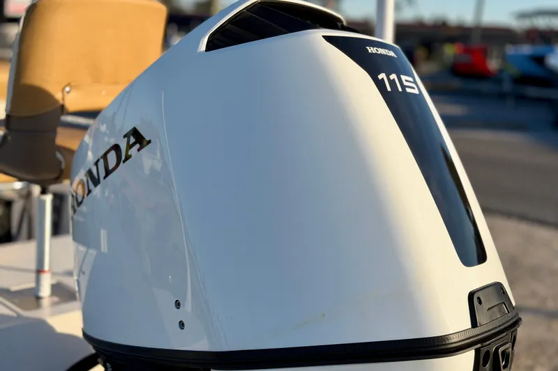 Slide: The Image of Honda 115 outboard motor on a 2026 Carolina Skiff 178 JLS boat. - 6