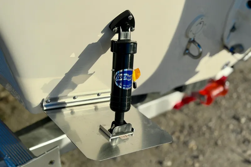 Slide: The Image of Trim tab on 2026 Carolina Skiff 178 JLS boat, enhancing stability and performance. - 7