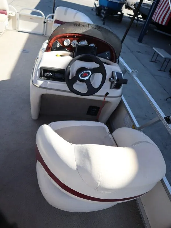 Slide: The Image of Helm console of a 2011 Sun Tracker Party Barge 21 pontoon boat. - 15