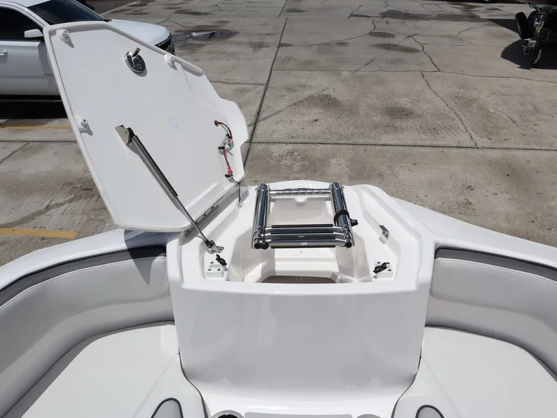 Slide: The Image of Yamaha Boats SX250 2026 with open bow hatch and ladder. - 17
