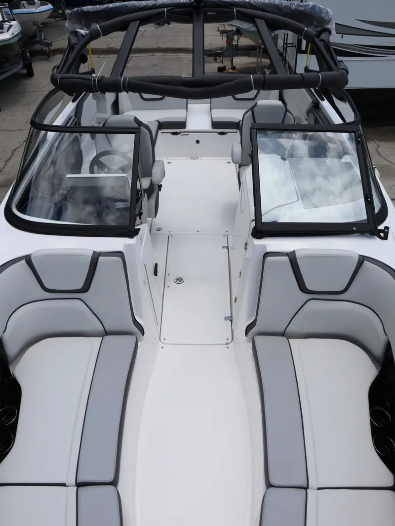 Slide: The Image of Interior view of 2026 Yamaha Boats SX250 with gray upholstery. - 20