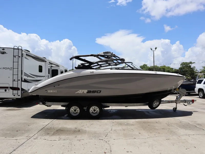 Slide: The Image of 2026 Yamaha SX250 boat on trailer in sunny weather. - 5